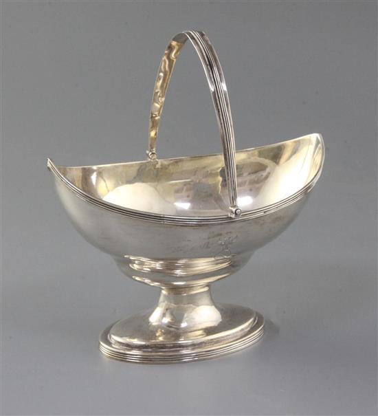 A George III silver boat shaped pedestal sugar basket by Peter & Ann Bateman, 7 oz.